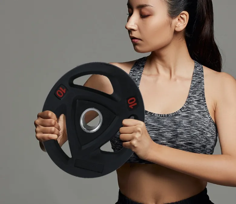 Zaoblená závaží na činku se 3 otvory pro uchopení